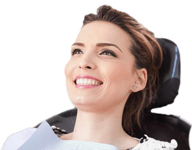 Woman in dentist chair smiling